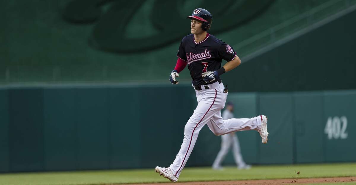 WASHINGTON, DC - JULY 23: Trea Turner #7 of the Washington Nationals rounds the bases after hitting a home run against the Colorado Rockies during the first inning at Nationals Park on June 23, 2019 in Washington, DC. (Photo by Scott Taetsch/Getty Images)