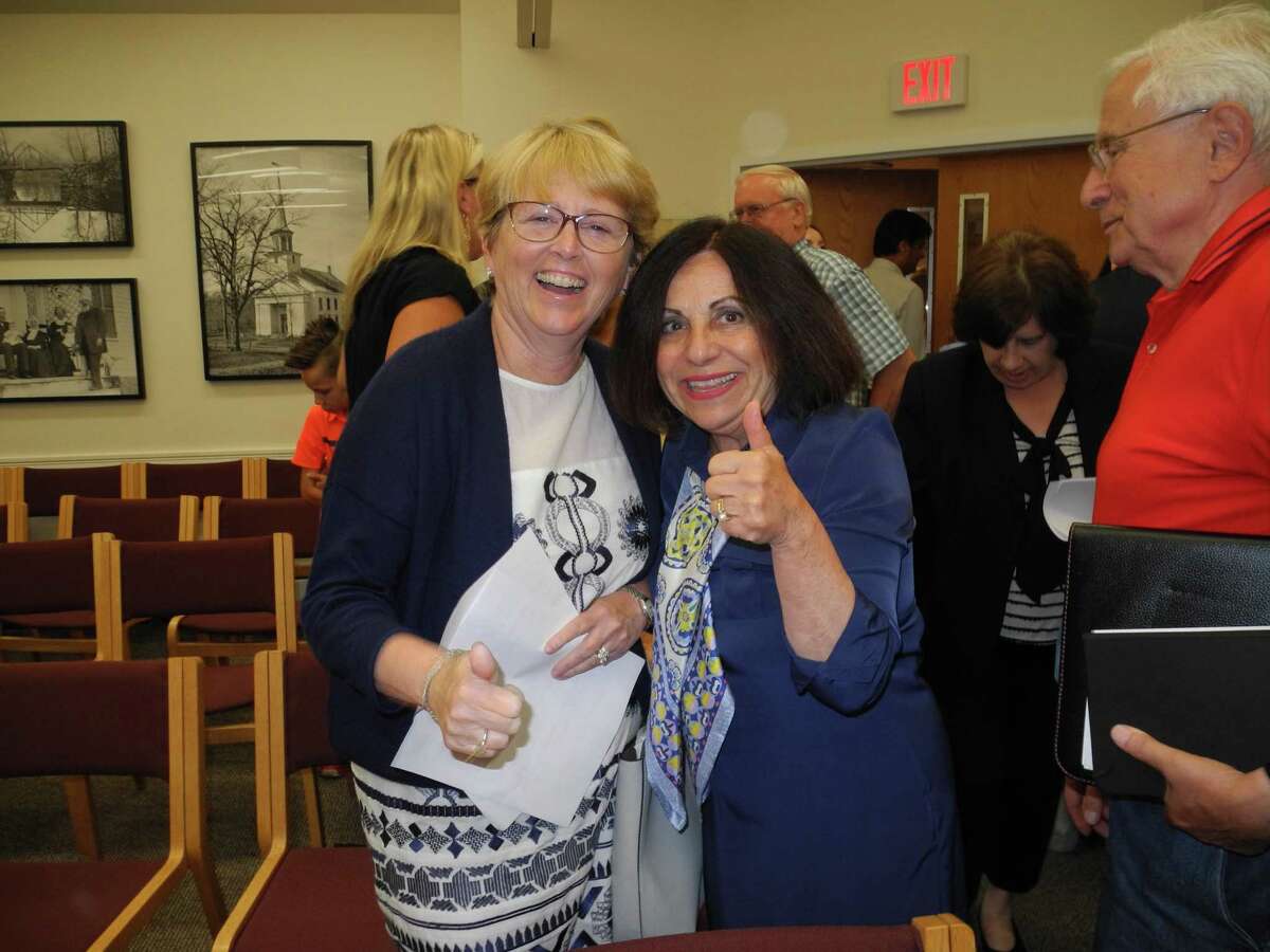 Lynne Vanderslice, left, and Toni Boucher give a thumbs-up following Vanderslice winning the Republican nomination for first selectman.