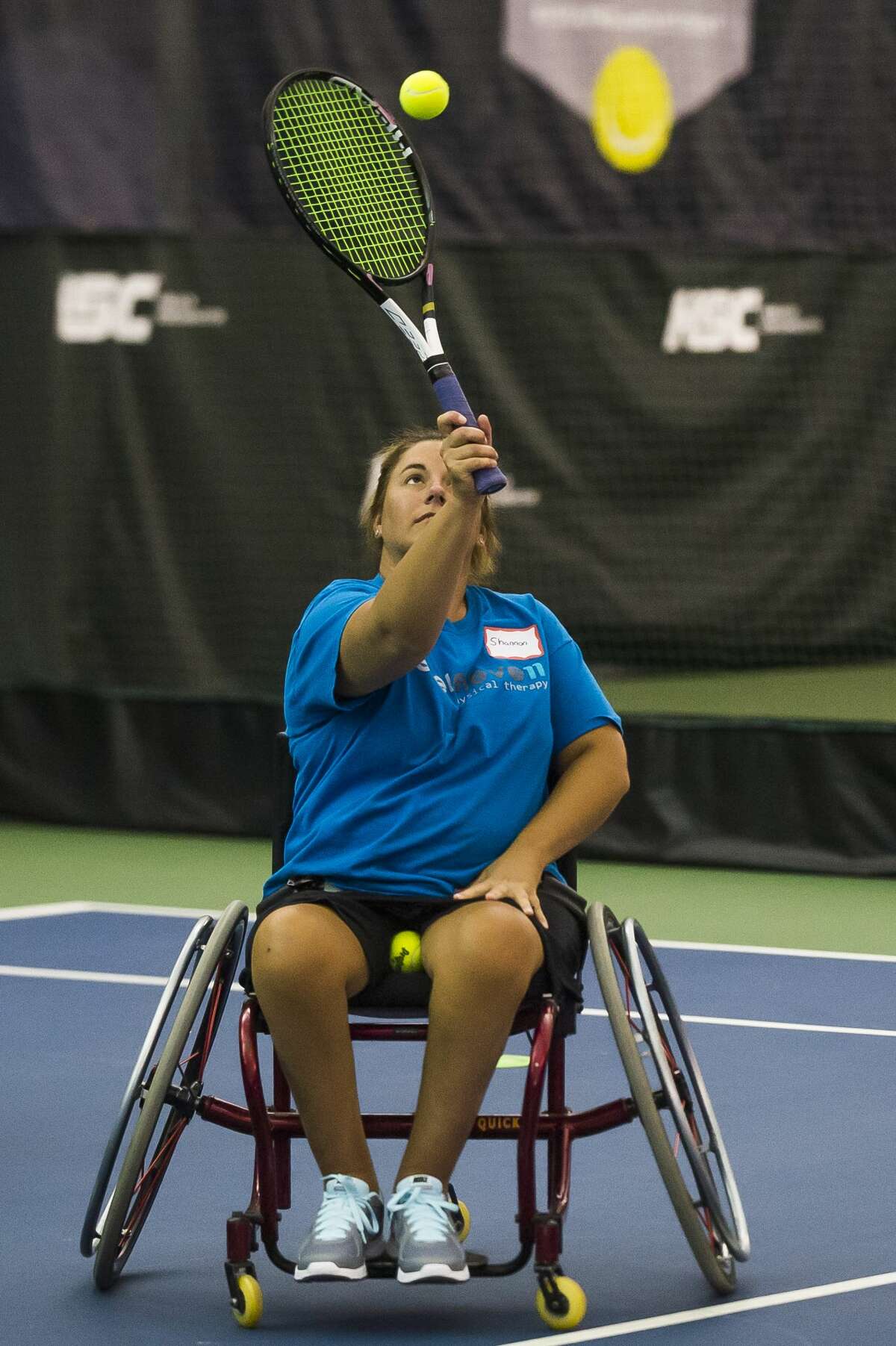 Shannon Zilska of Auburn participates in a wheelchair tennis clinic on Thursday, July 18, 2019 at Greater Midland Tennis Center. (Katy Kildee/kkildee@mdn.net)