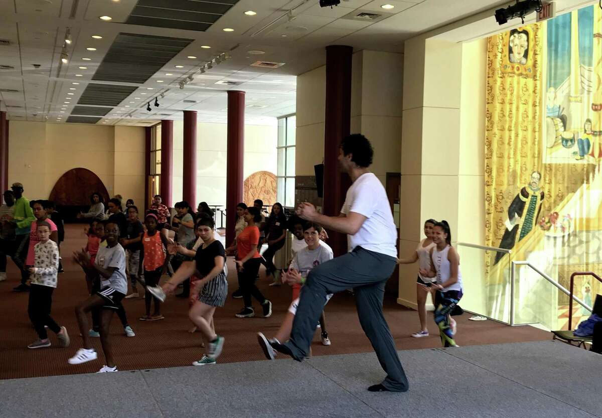 “In the Heights” assistant choreographer Luis Salgado leads a group of aspiring young performers in choreography at The Palace Theatre’s Triple Threat Performer Intensive.