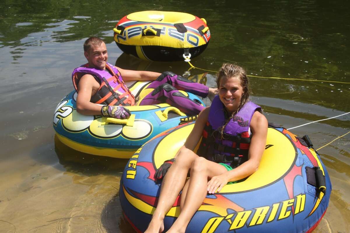 TUBING: As one of the few flat pieces of land along the Muskegon River in Mecosta County, Brower Park is a docking spot for many after a day of playing on the water. (Pioneer photo/Nico Rubello)