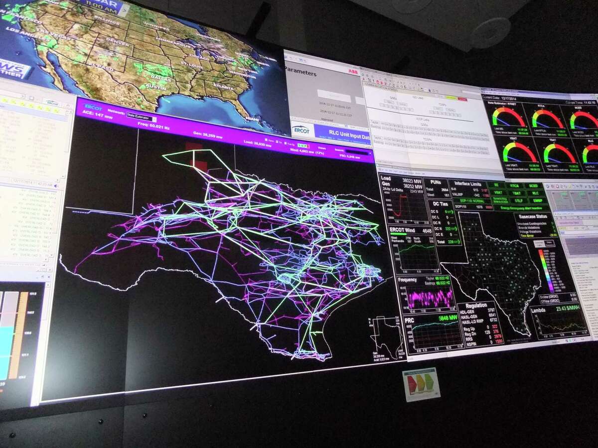 A map of Texas showing the state's transmission lines is a focal point in the control room of the Electric Reliability Council of Texas, which operates most of the state's power grid.