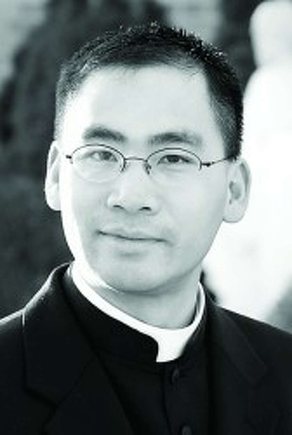 Father Lam T. Le