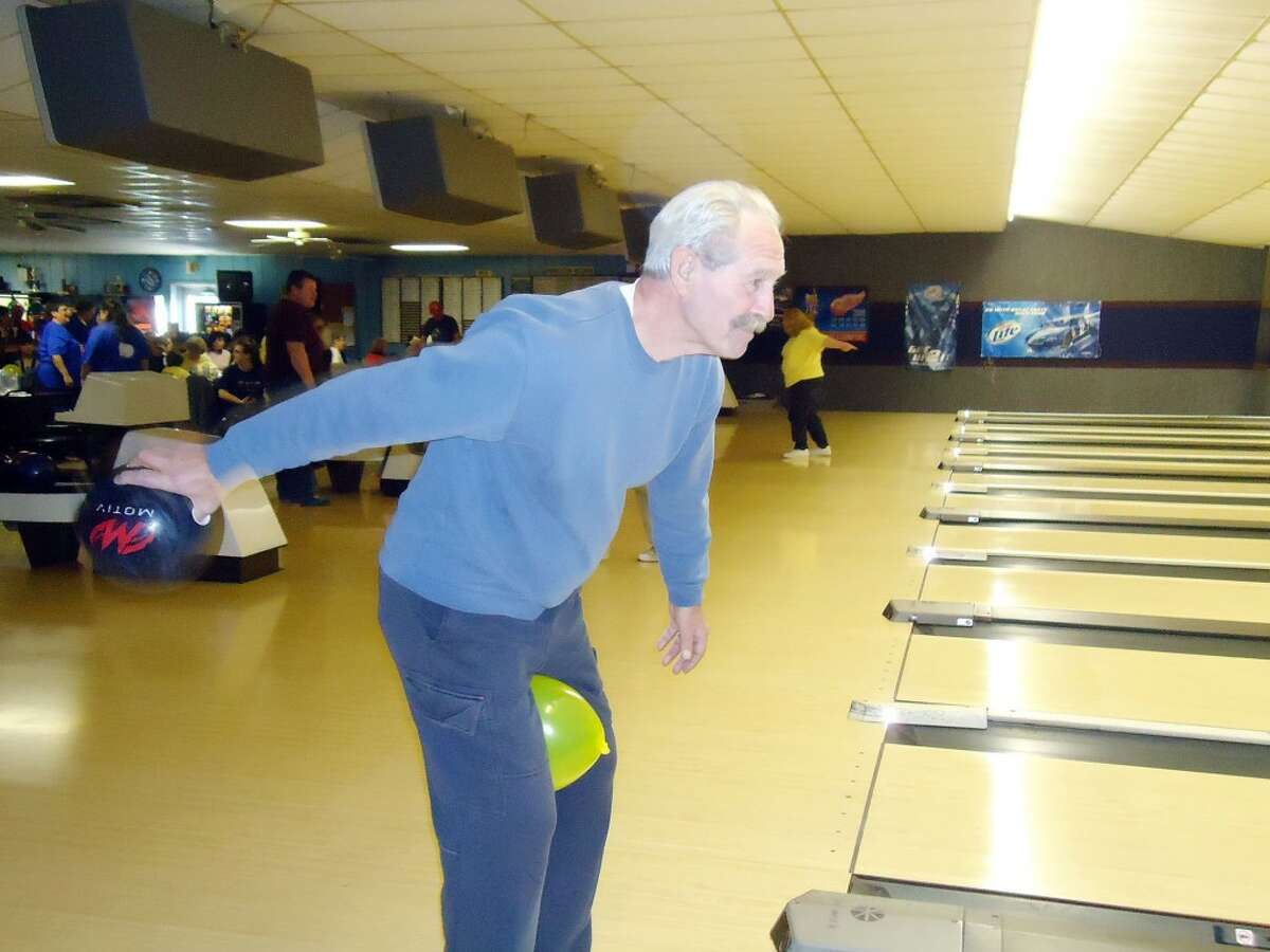 WHACKY BOWLER: A Bowl-A-Thon fundraiser participant gets ready to throw his ball down the lane last month. The fundraiser benefited the Mecosta County Commission on Aging and Senior Center’s transportation program and is expected to have raised more than $9,000. (Courtesy photo)