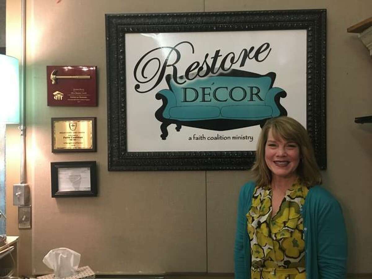 Restore Décor founder and Executive Director Dana Adams stands at the desk of Restore Décor’s retail store, at 111 N. Second St., in Edwardsville. Adams founded the 100% volunteer-operated nonprofit outreach organization in 2013. She lives in Edwardsville with her husband and daughter, Emilee, 18, who will attend the University of Southern Indiana this fall, majoring in biology and pre-dentistry; their son, Justin, 24, is an engineer in Dallas, Texas.