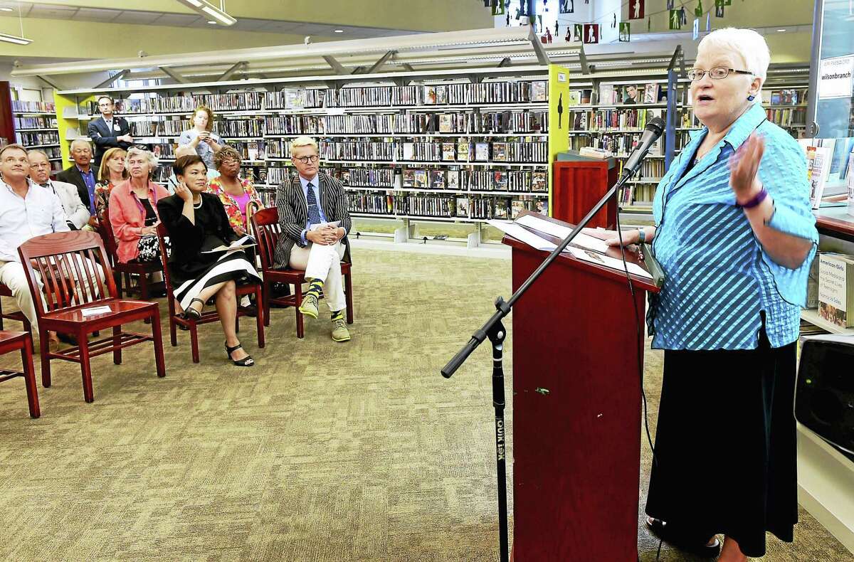 City Librarian Martha Brogan welcomes guests and visitors during the 10th anniversary celebration of the Courtland S. Wilson Branch of the New Haven FreePublic Library in the city's Hill neighborhood Thursday morning, September 15, 2016.