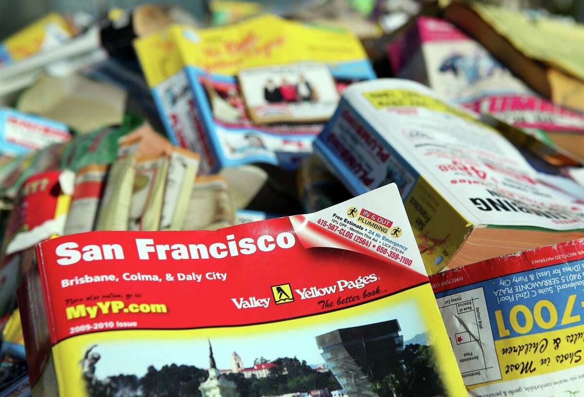 A pile of phone books, which presumably no one wants, in San Francisco. New Fairfield County directories will be delivered at the end of this year, but residents may opt out of receiving them.