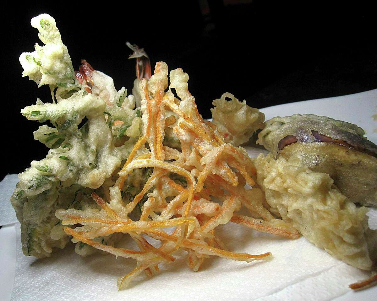 A tempura sampler with the Tokyo Inn Dinner might include spinach, sweet potato, shrimp, eggplant and green bell pepper at Niki's Tokyo Inn.