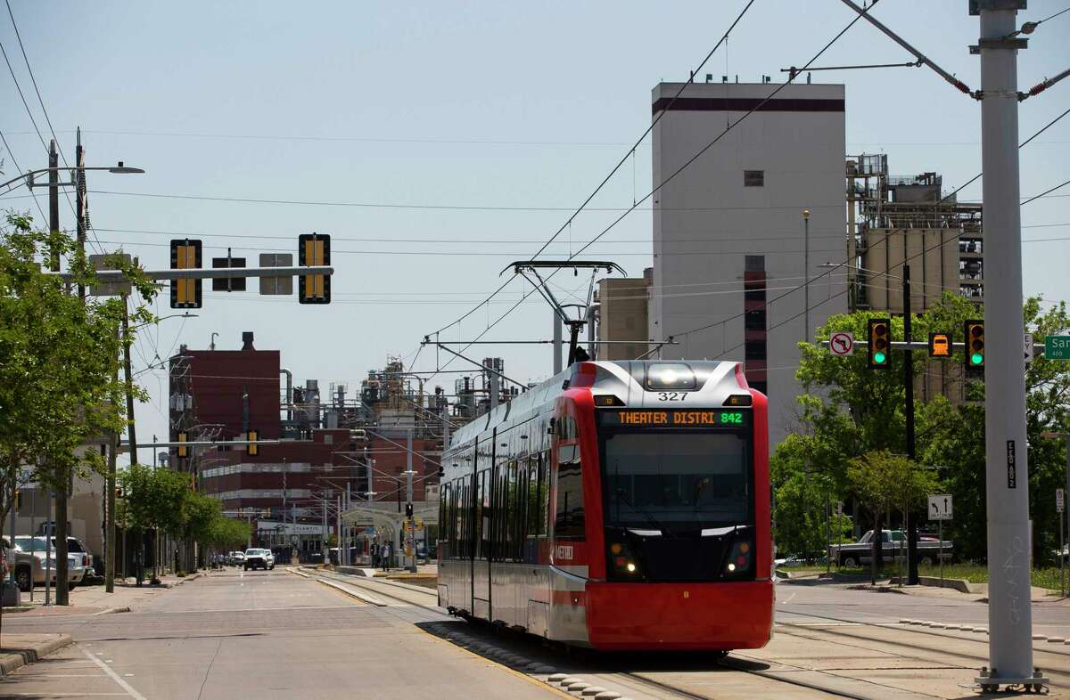 A Metropolitan Transit Authority light rail train passes along Harrisburg Boulevard in Houston's East End on April 19, 2018.