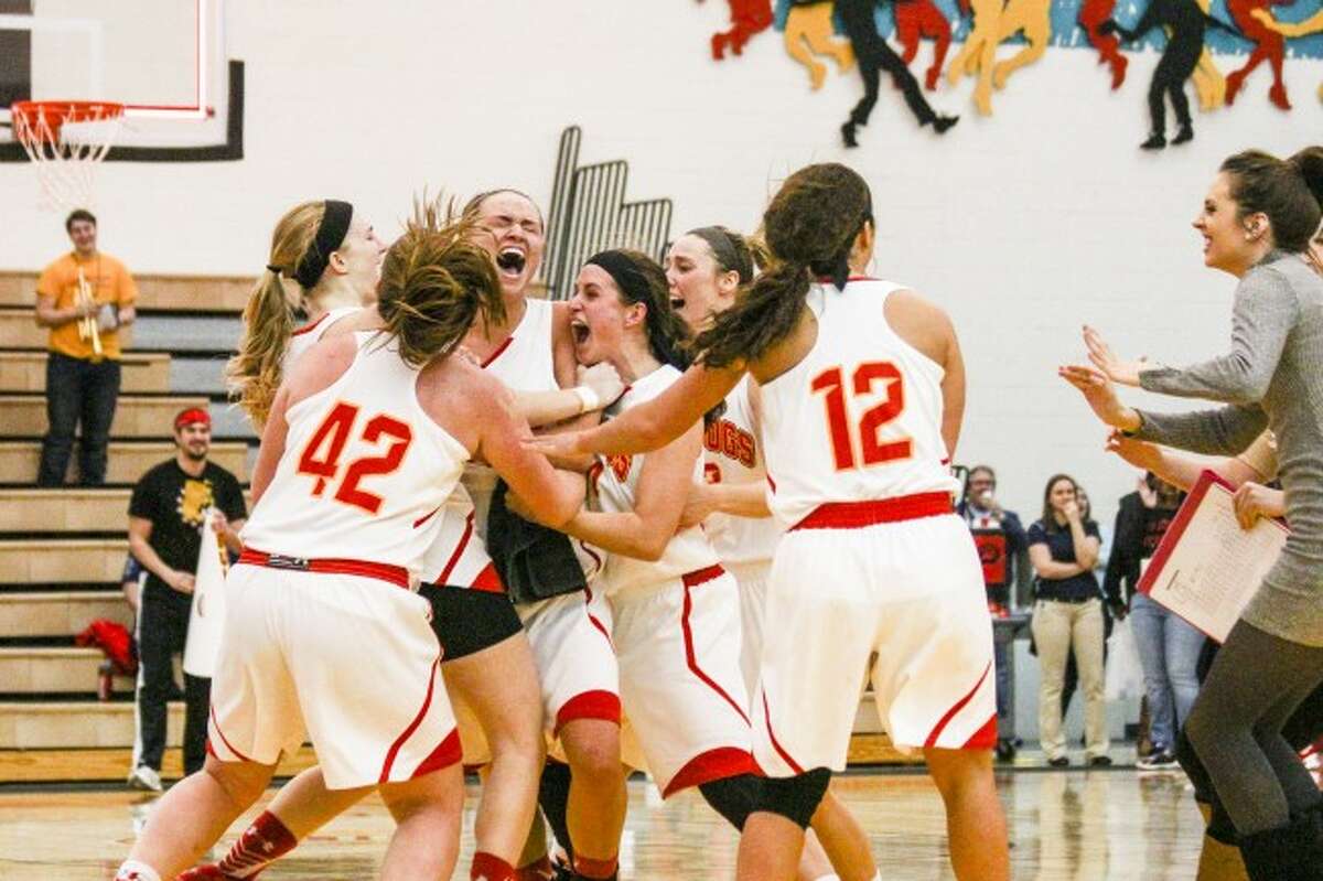 GAME-WINNER: The Ferris State University's women's basketball team celebrates at mid-court after Emily Evans' last-second game-winner over Saginaw Valley State University on Saturday. (Pioneer photo/Ryan Zuke)