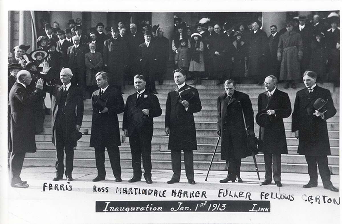 INAUGURATION: Woodbridge N. Ferris (left), founder of Ferris State University, is inaugurated as governor of Michigan in 1913. The campus will host a centennial celebration of his gubernatorial role on Jan. 16. (Courtesy photo)