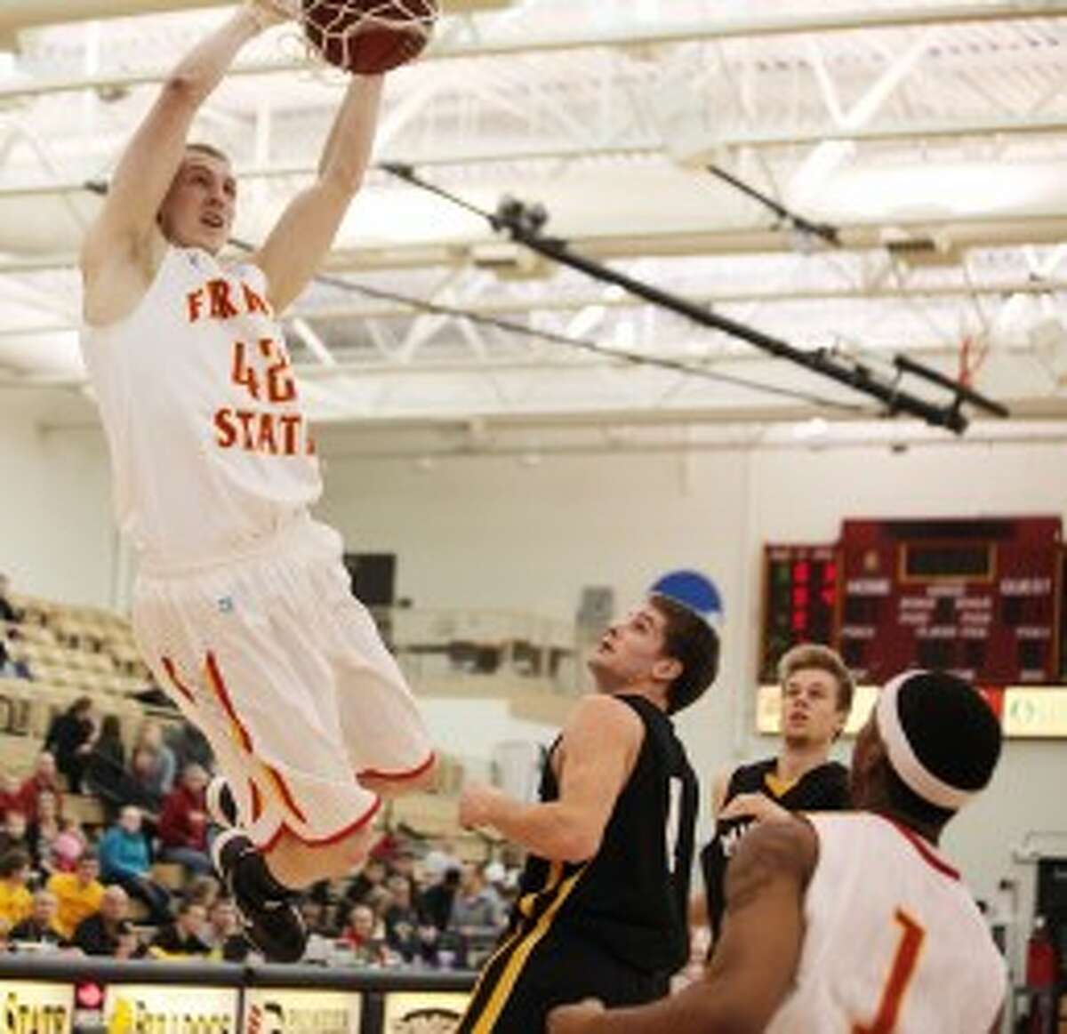 JAM TIME: Ferris State's Trent Messer stuffs home a dunk early on against Michigan Tech. (Pioneer photo/Martin Slagter)