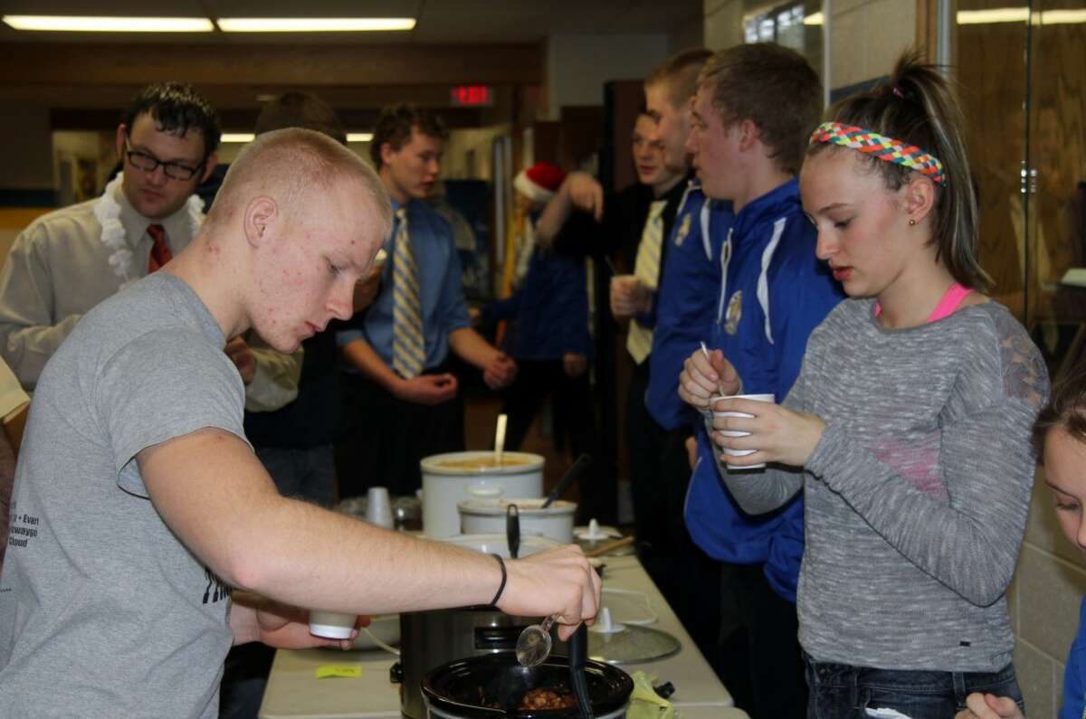 CHILI COOK-OFF: Evart High School students in the Generation E class host a chili cook-off before winter break. The class organized the cook-off as a fundraiser to benefit the Sears Food Pantry. (Pioneer photos/Lauren Fitch)