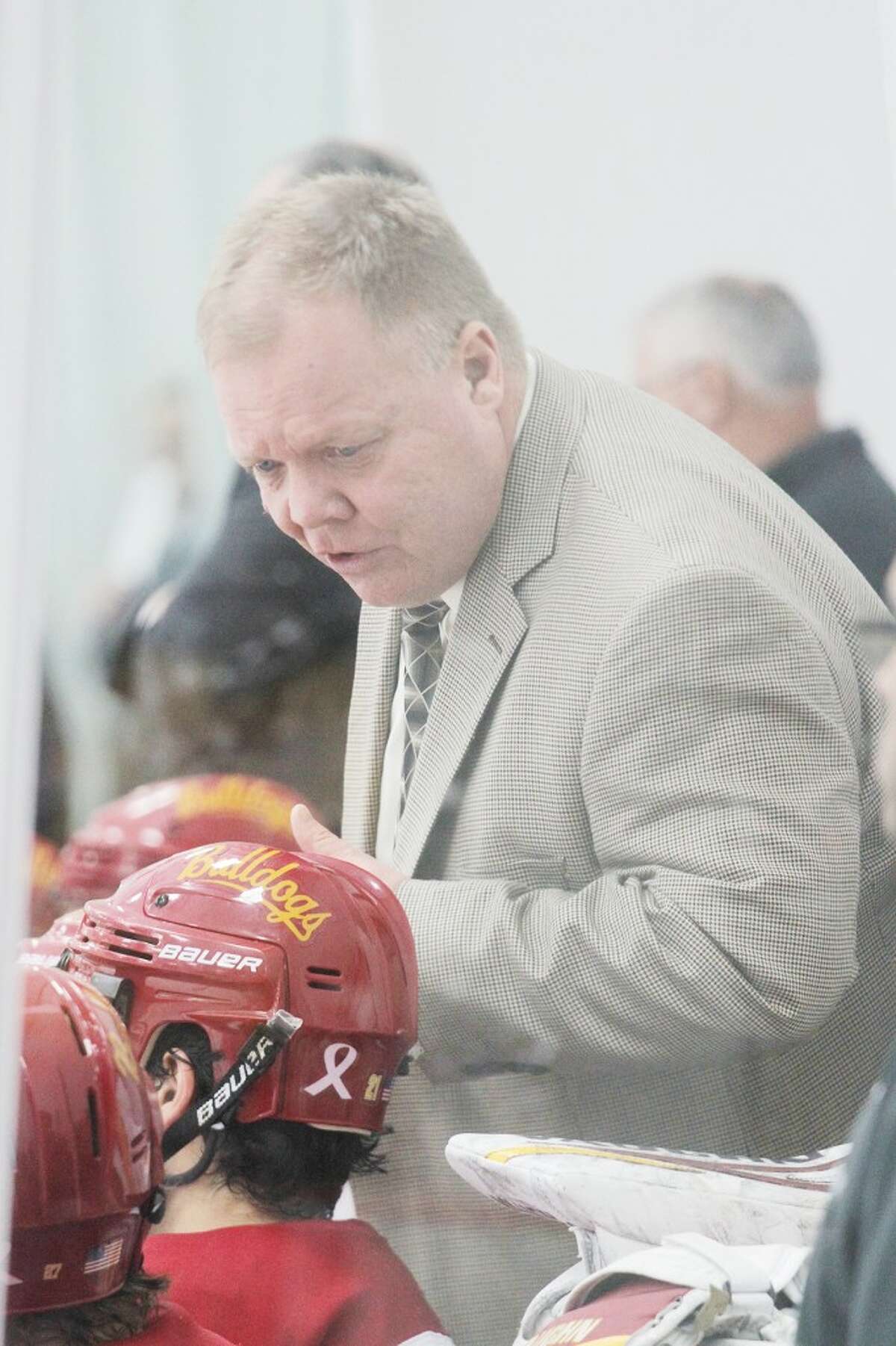 HONORED: Ferris State University hockey coach Bob Daniels guides his players through a game against Ohio State University this weekend. Daniels received a Northern Lights award after Saturday's game. (Pioneer photo/Marty Slagter)