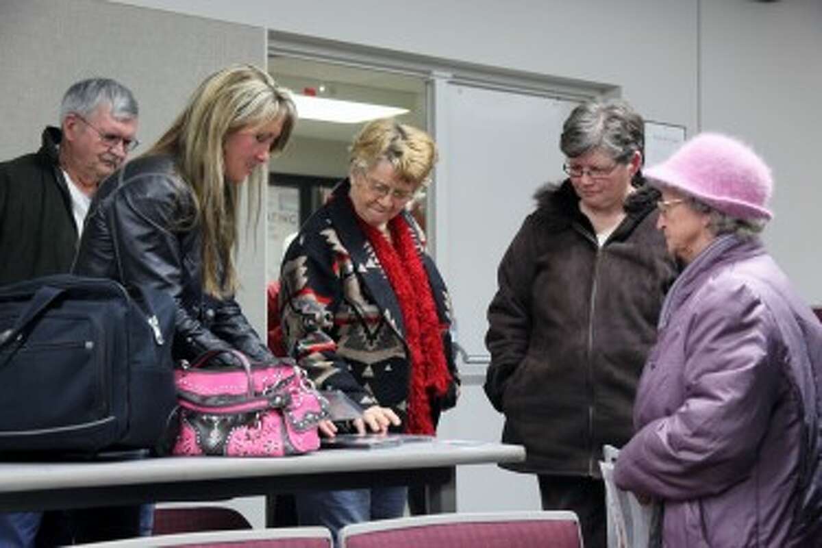Rebecca Kiessling greets people after her presentation at Ferris. (Pioneer photos/Lauren Fitch)