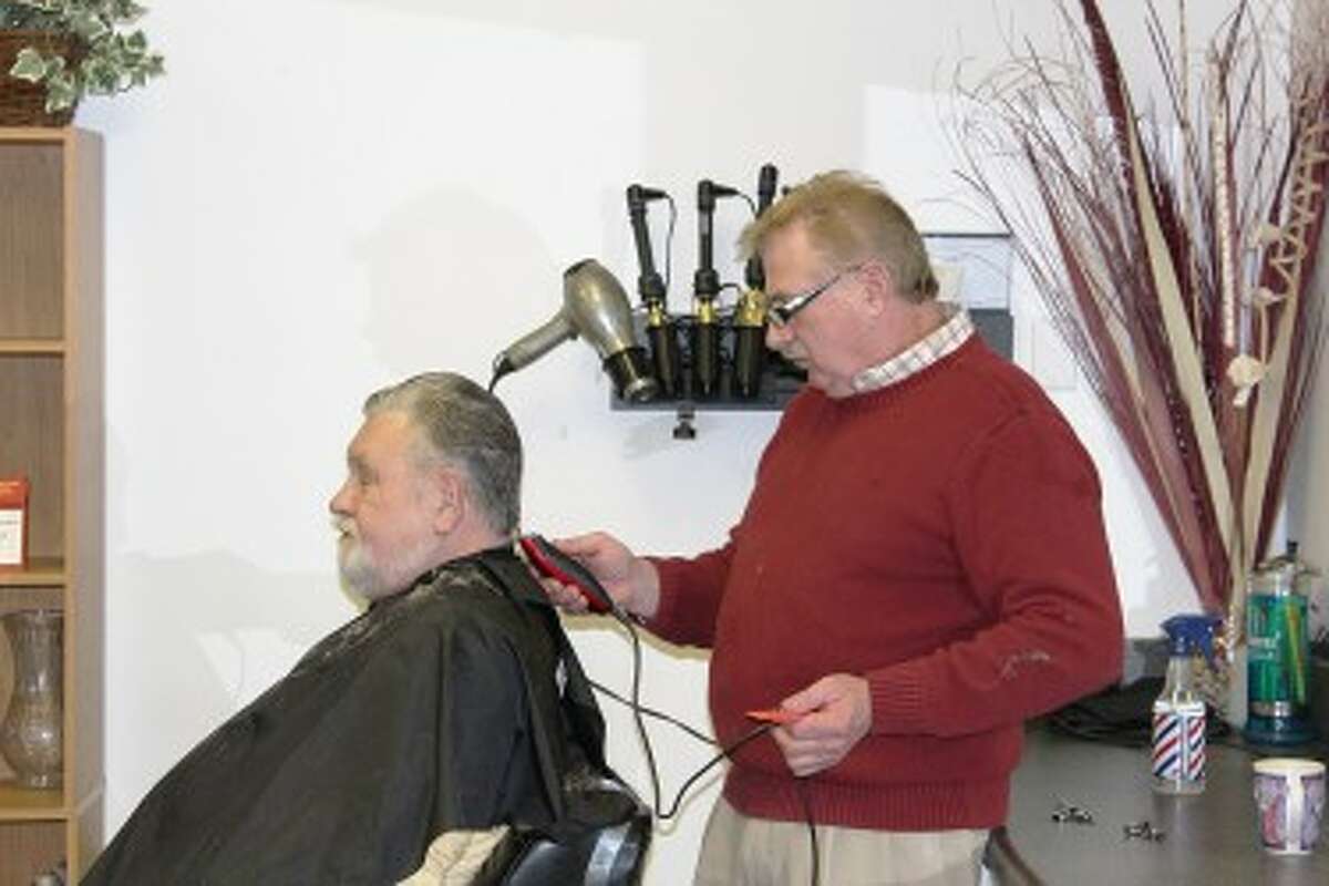HAIRCARE: Vince Mako has trimmed Gary Frye’s hair since he opened his salon more than four years ago. Cuts and More is located at 6604 Nine Mile Road in Mecosta. It is open six days a week. (Pioneer photos/Lauren Gentile)
