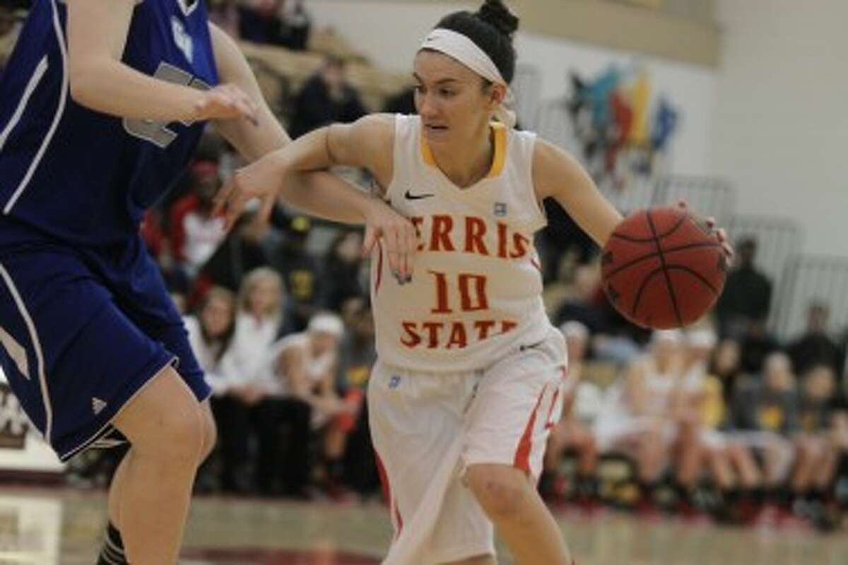 DRIVING: Ferris State's Kylie Muntz takes the ball to the basket during the first half against Grand Valley State. (Pioneer photo/Martin Slagter)