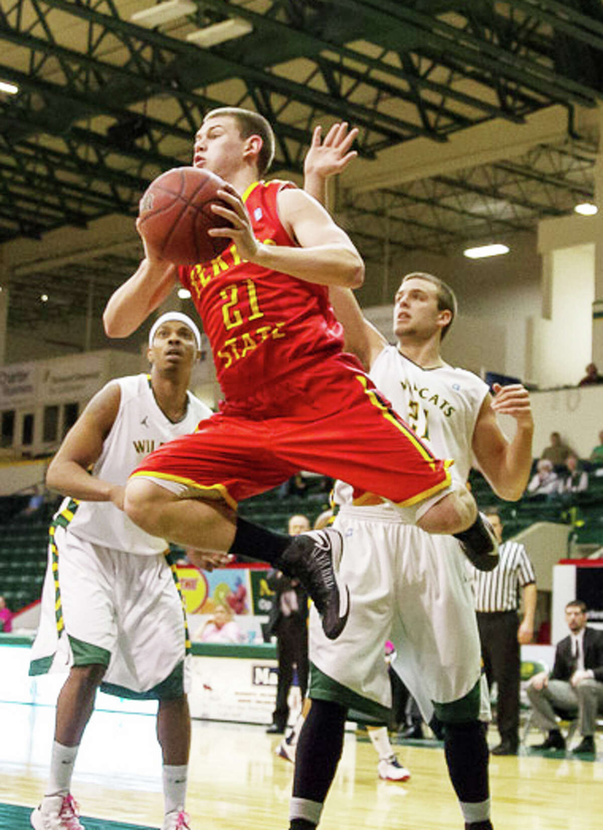 UP IN THE AIR: Ferris State sophomore Drew Lehman looks for someone to pass to during the Bulldog’s 69-63 win Saturday over Northern Michigan. (Courtesy Photo/Ferris State Ben Amato)