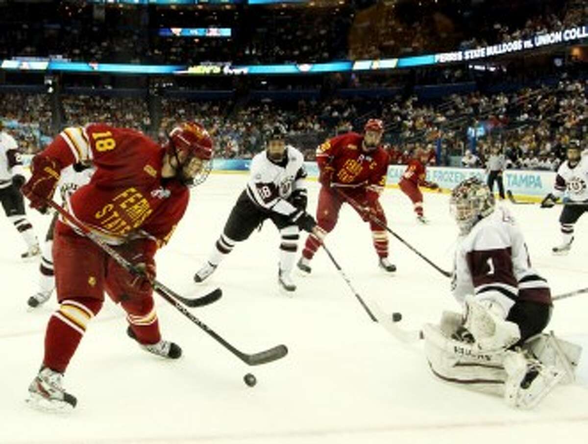 BIG STAGE: Ferris State’s Andy Huff looks to put a shot on net against Union in the NCAA national semifinal. FSU’s appearance in the Frozen Four could help ticket sales for the program this fall. (Pioneer file photo)
