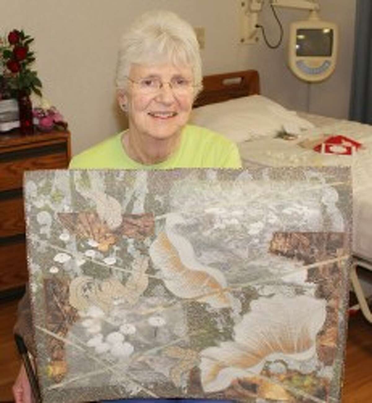CREATING ART: After Kelly’s stroke, she was worried she would not be able to create wall hangings. On her last day of rehab at Mecosta County Medical Center, she was able to sew again.