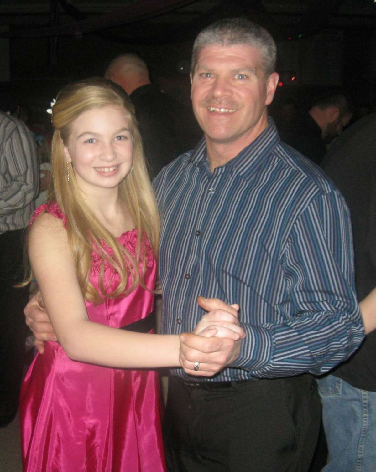 DANCING THE NIGHT AWAY: Morley Stanwood Elementary School held its first Daddy-Daughter Dance on Feb. 9. More than 180 people attended the dance, which was funded by the student council. (Courtesy photos)