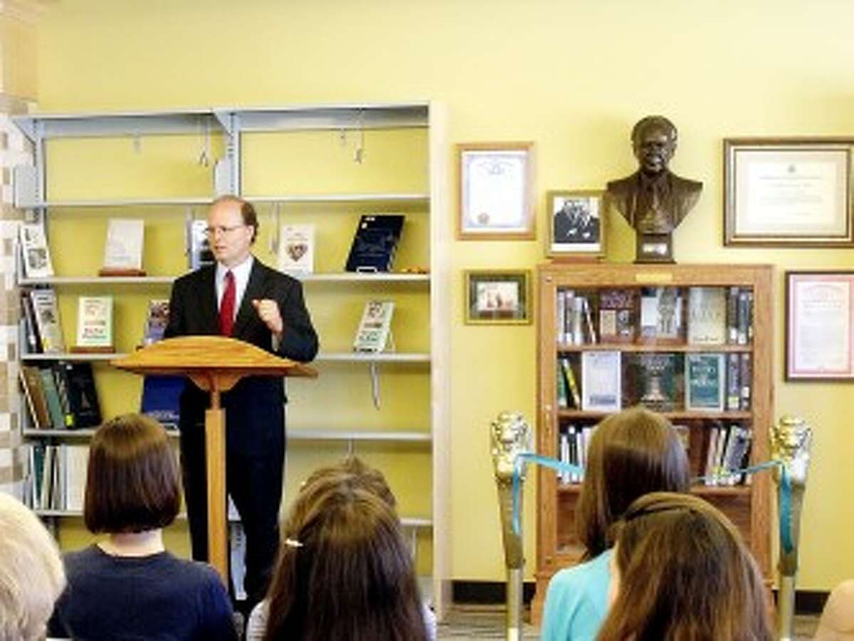 IN MEMORY: Dr. Jeffrey Nelson offers remembrances of Russell Kirk during the dedication on Saturday at the Morton Township Library.