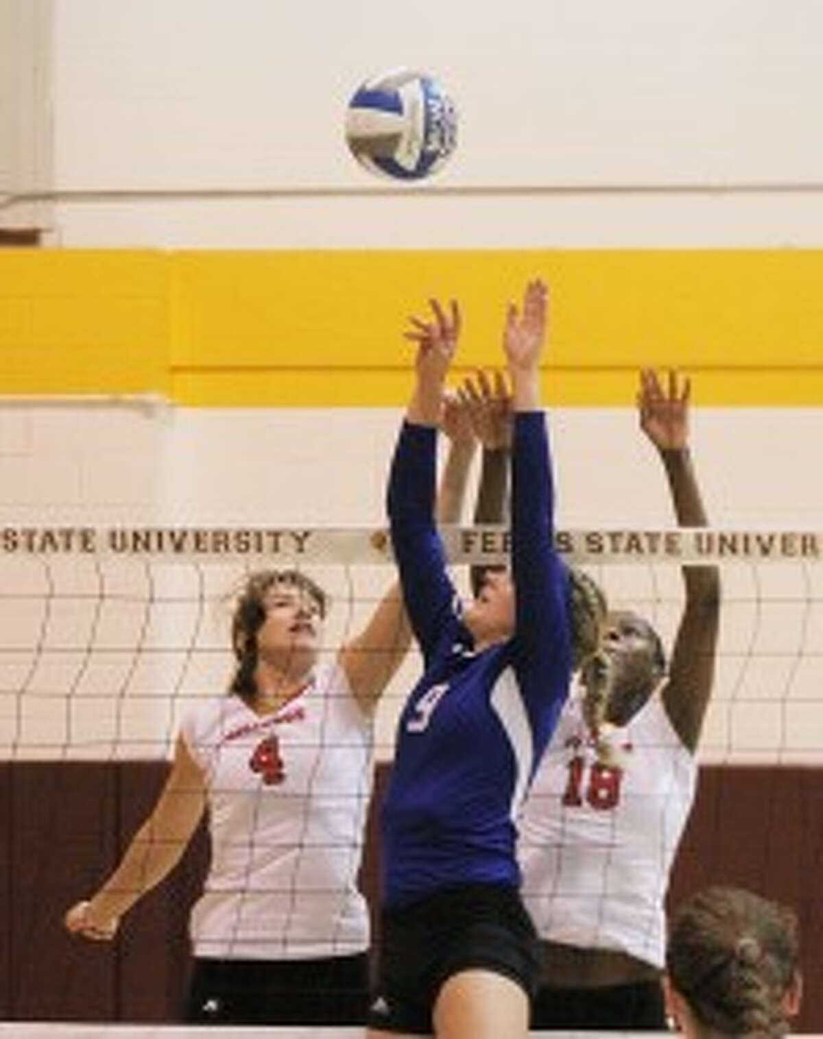 AT THE NET: Ferris State's Megan VanderMeer (left) and Angi Kent (right) will be counted on to be leaders next volleyball season. (Pioneer file photo)