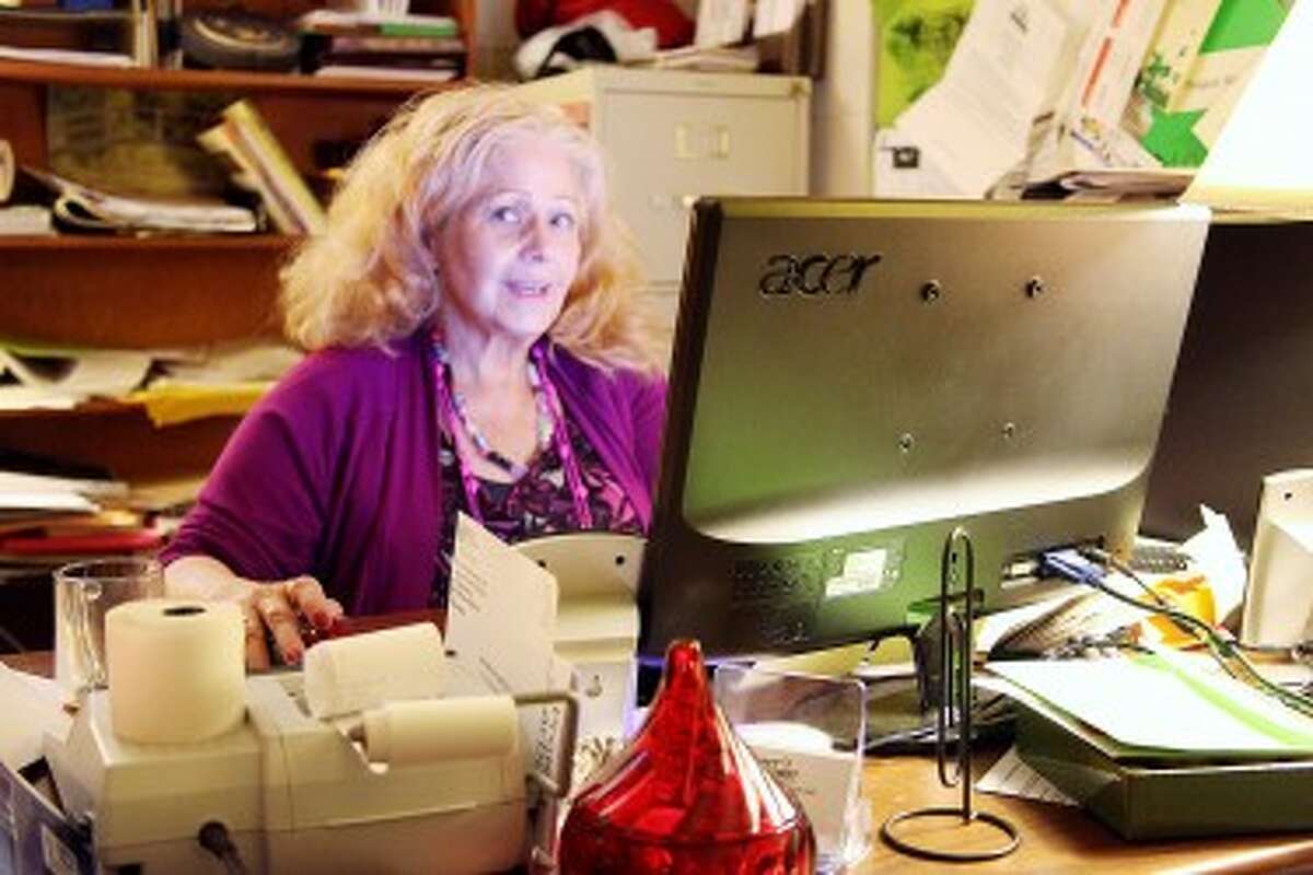 ONLINE UPDATE: Diane Long, executive director of Project Starburst, checks the nonprofit’s Facebook page. After creating the profile about a year ago, Long recently updated it and began using it more frequently after attending tutorials on how to use social media run by the Mecosta County Area Chamber of Commerce.
