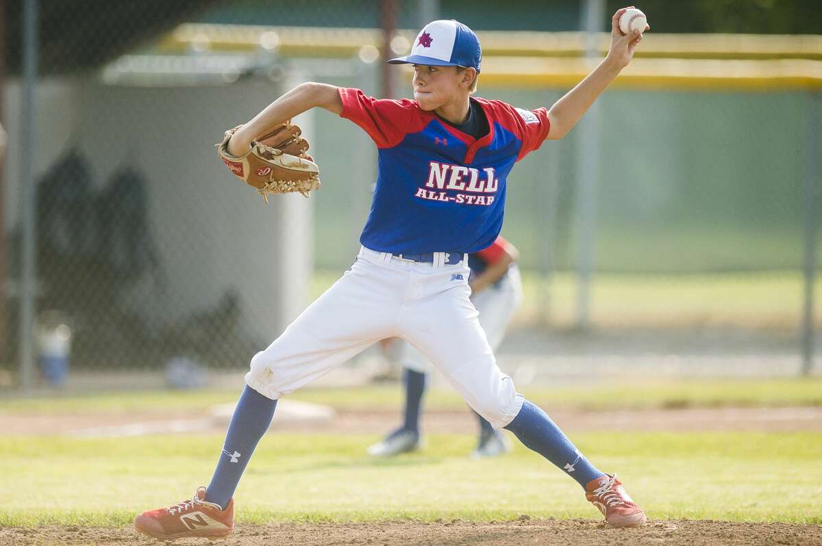 Jacoby Lind of Northeast Little League pitches the ball during the winner's bracket final of the minor Little League district tournament against Shepherd on Thursday, July 25, 2019 at the Fraternal Northwest Little League fields in Midland. (Katy Kildee/kkildee@mdn.net)