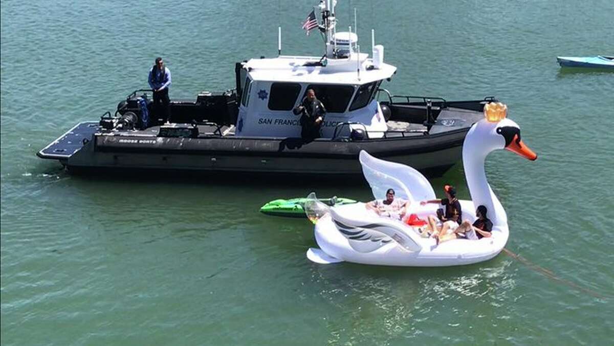 These Giants fans' swan float started taking on water, and SFPD's marine unit asked the group to remove the float out of safety concerns.