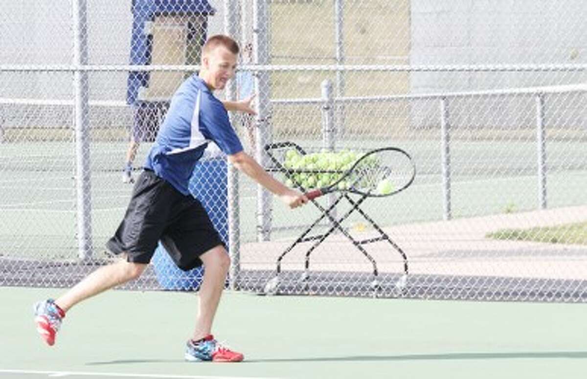 RUNNING IT DOWN: Big Rapids' Sterling Brinker goes after a shot during Thursday's tennis match against Sparta. (Pioneer photo/Bob Allan)