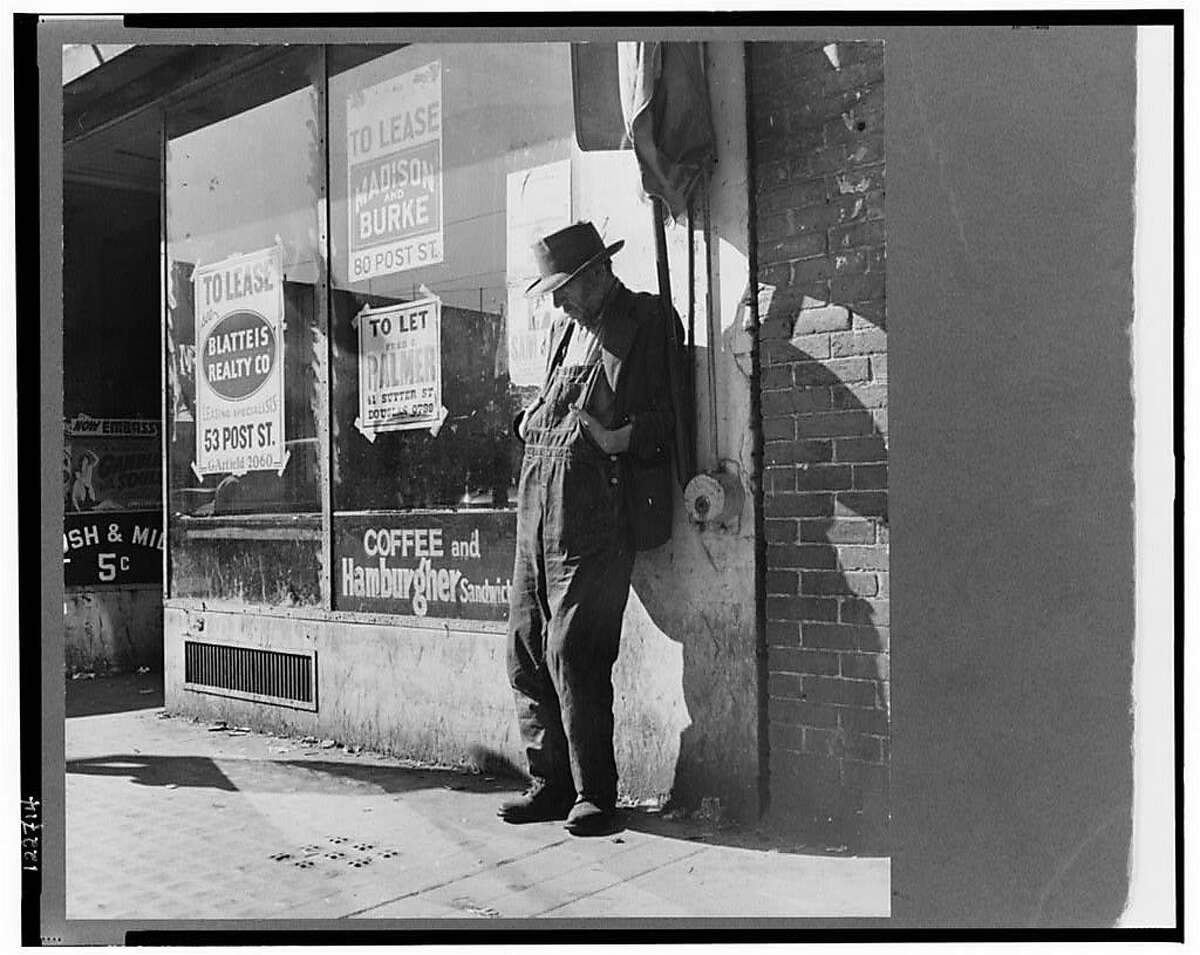 “贫民窟”。1937年2月，加利福尼亚旧金山霍华德街