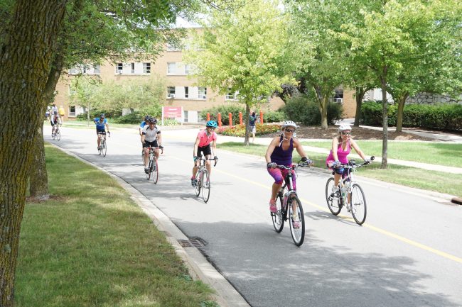 Riding for wishes: Wish-A-Mile 300 bicyclists rest in Big Rapids Friday