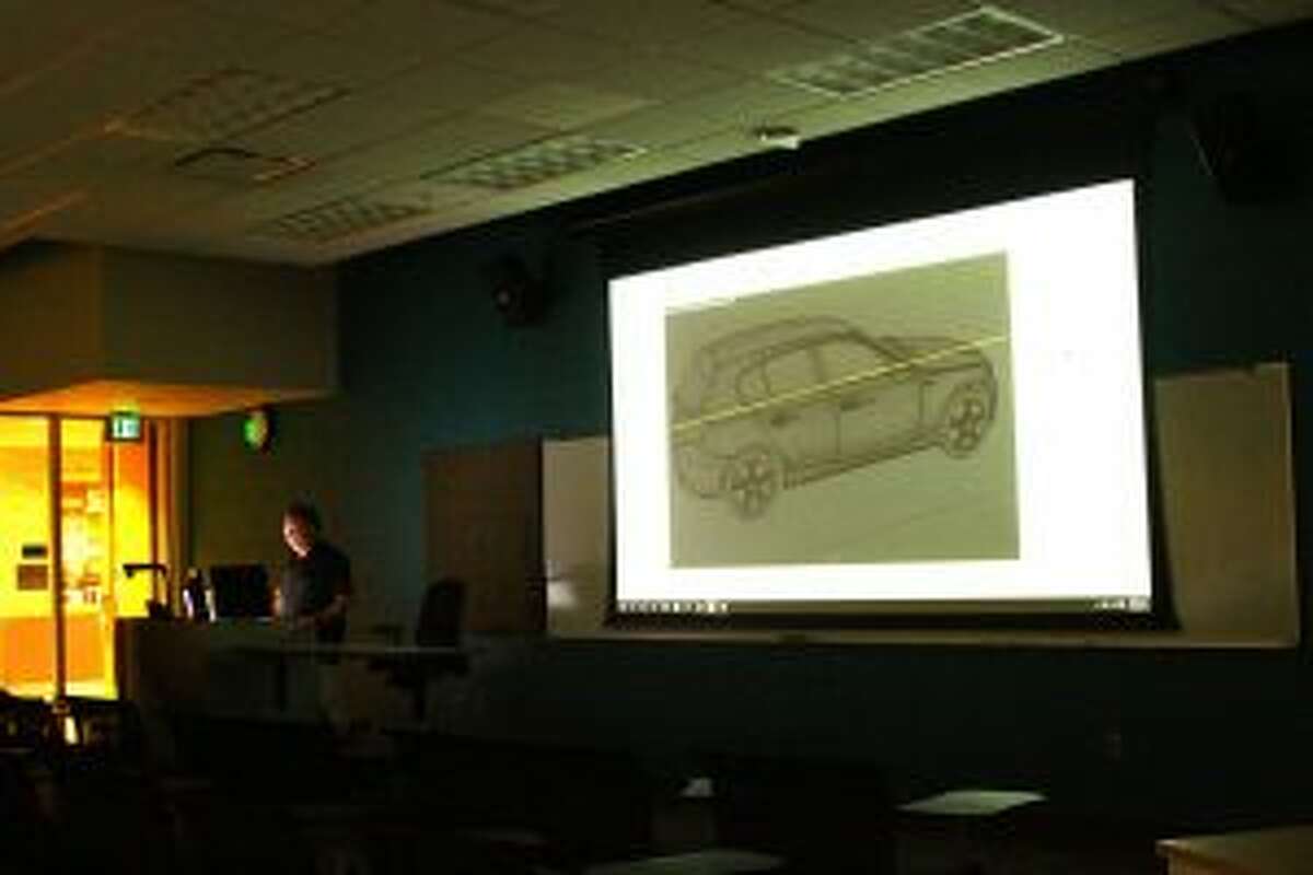 SHOWING A CAR: Professor Martin Lier shows students the amount of pixels needed to create something as complex as a car.