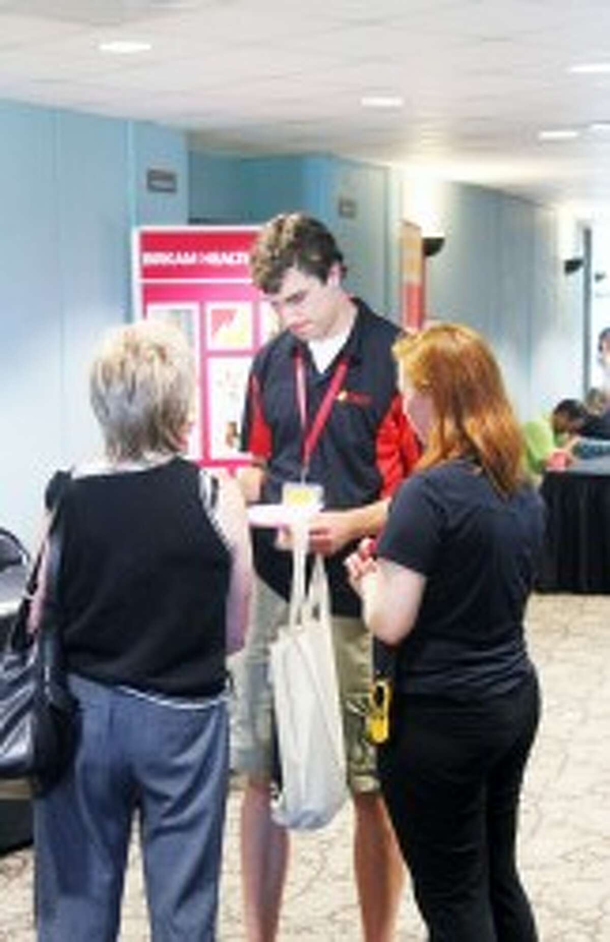 NEW TO FERRIS: A Ferris State University orientation leader talks to parents on Monday. During the orientation sessions, students and their friends and family have the chance to learn about their academic program, on-campus services and extracurricular activities at Ferris.