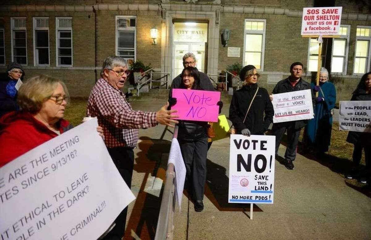 Republicans Greg Tetro, second from left, and Peter Squitieri, in black, pictured at a past Save Our Shelton rally, are planning to primary for Board of Aldermen third ward.