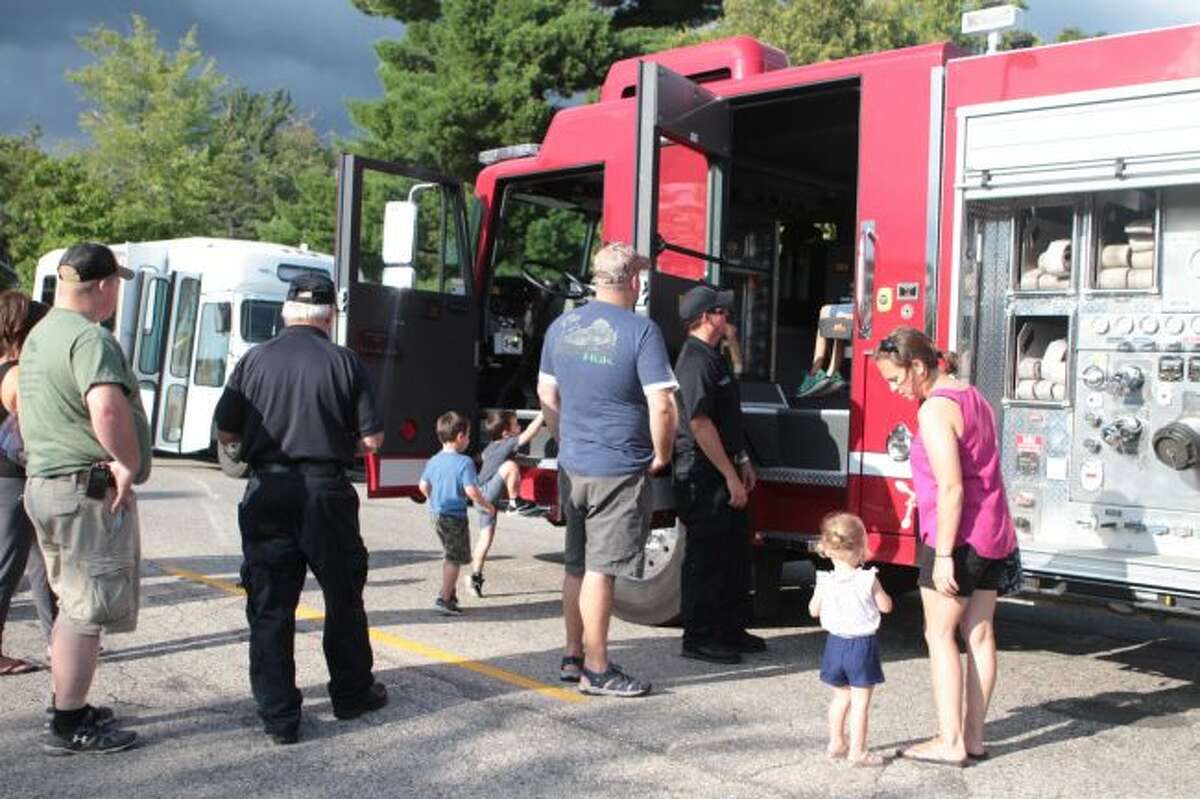 During the National Night Out festivities on Tuesday, area residents had the opportunity to check out the Big Rapids Department of Public Safety fire engines and police cars and meet local first responders.