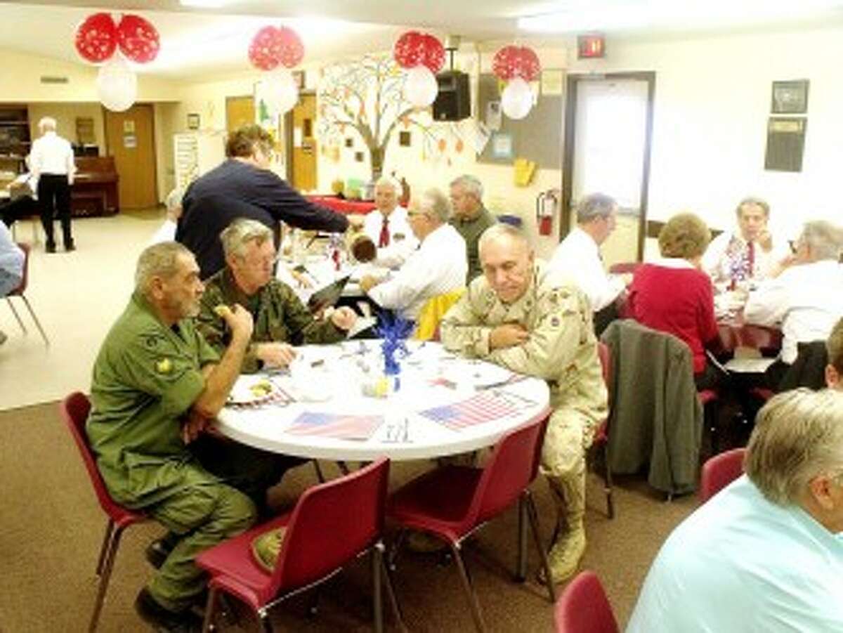 HONORING VETERANS: Hundreds turned out to join in honoring local veterans during the Mecosta County Senior Center’s annual Veterans Day salute on Friday. (Pioneer photo/Jim Crees)