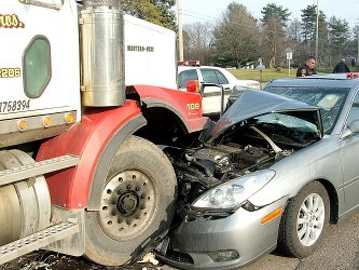 Car Hits Semi-truck Head On