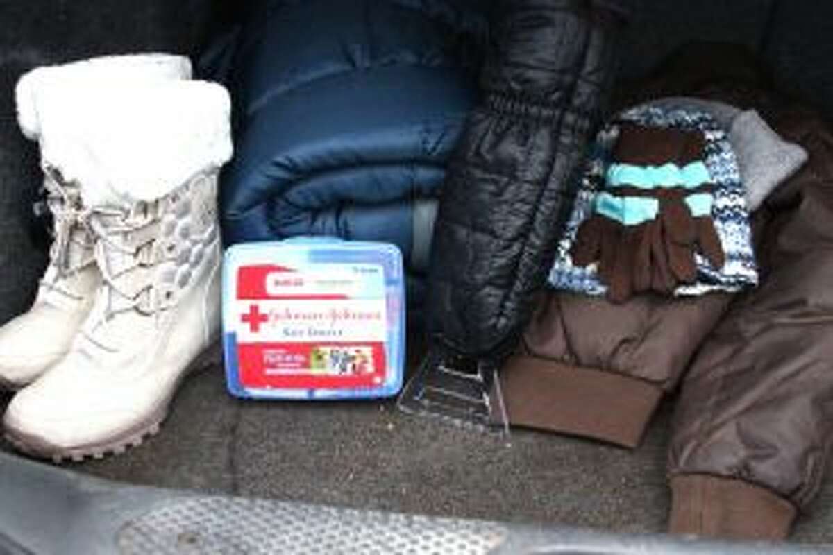 VEHICLE PREP: To be prepared in case of an emergency on the road, drivers are encouraged to have boots, a blanket, a first-aid kit, gloves, an ice scraper and other items in the vehicle.