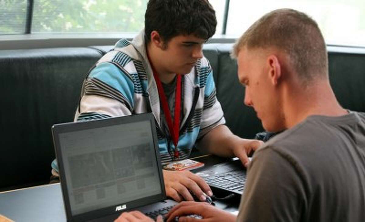 Ferris freshmen Gage DeHaven (left) and Nathanael Millen spend some time in FLITE between classes.