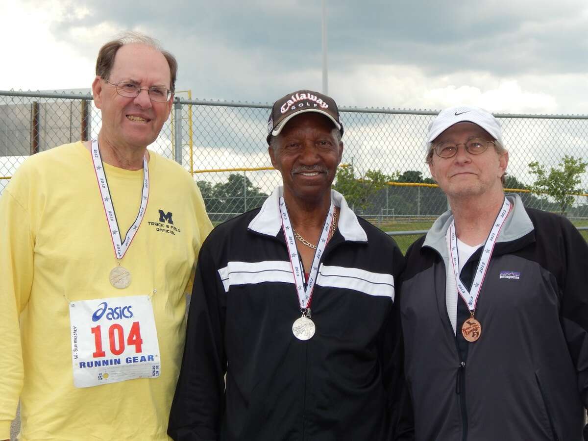 OLYMPIC MEDALISTS: 2013 Michigan Senior Olympic javelin medalists pose after the competition on Aug. 11. Big Rapids resident Bill Burmeister (left) won the gold medal, Malachi McGruder (center) took silver and Ron August came away with the bronze. (Courtesy photo)