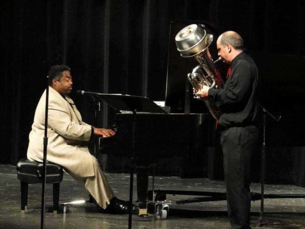 During a previous Tuba Bach concert, Alvin Waddles (left) and Ed Mallett perform together. This weekend, the musicians will be joined on stage by Dominic Waddles and Noah Mallett for the All-American Ragtime Celebration, which will be presented three times from Friday to Sunday. (Courtesy photo)