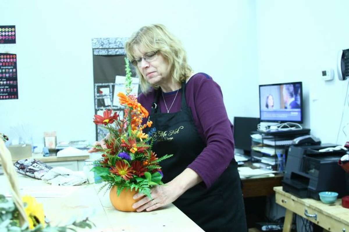 LEARNING THE TRADE: Anja Fitzgerald learned how to be a florist where she lived in Germany. Now she works as co-owner of Forget Me Not Floral and Design with Megan Gifford. (Pioneer photo/Meghan Haas)