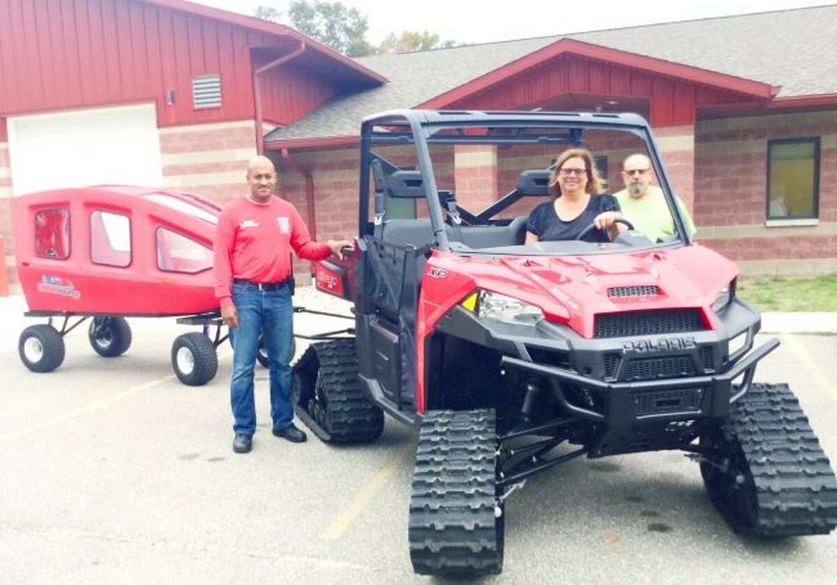 RESCUE: Webber Township Fire Chief Aaron Summers (from left to right), Webber Township Treasurer Pat Williams and Webber Township Supervisor Tony Gagliardo. The department recently received a new Polaris Ranger to assist with rescue and wildfire operations. (Pioneer photo/Shanna Avery)
