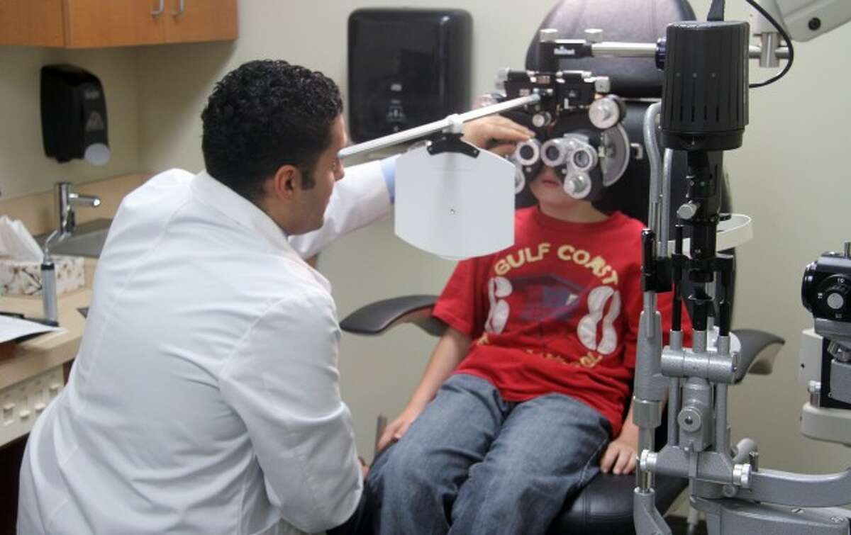 BETTER VISION: Xavier Guerra, a student at Mesick Consolidated Schools, is given an eye exam at Ferris State University's Michigan College of Optometry on Tuesday. The school identified students who needed eyecare, and they received free exams and glasses.