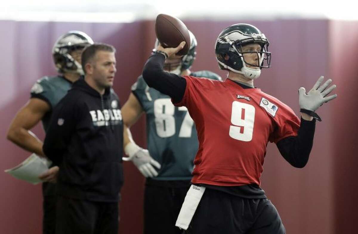 Philadelphia Eagles quarterback Nick Foles (9) throws a pass