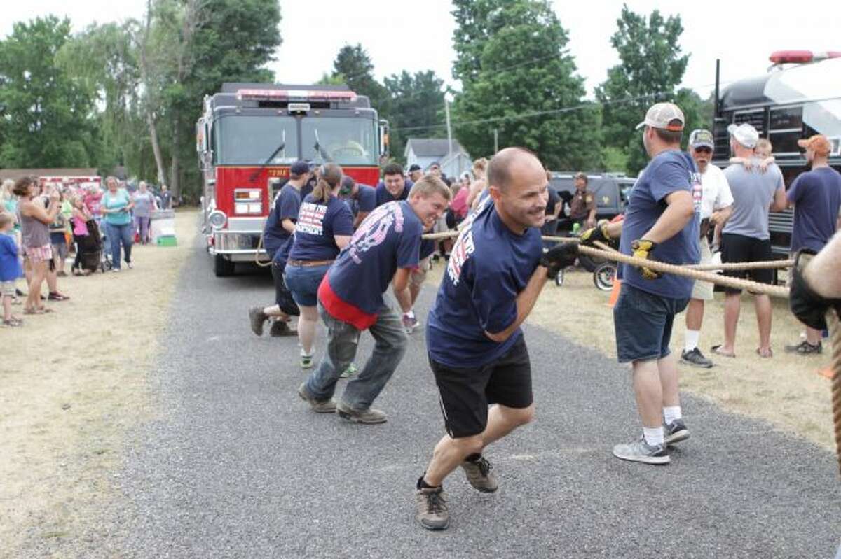 Teams will test their strength in a fire truck pull at the fairgrounds. The Big Rapids Township fire truck, weighing more than 55,000, will be pulled by teams of ten. All proceeds from the event will benefit the Area 5 Special Olympics, which serves Mecosta and Osceola counties. (Pioneer file photo)