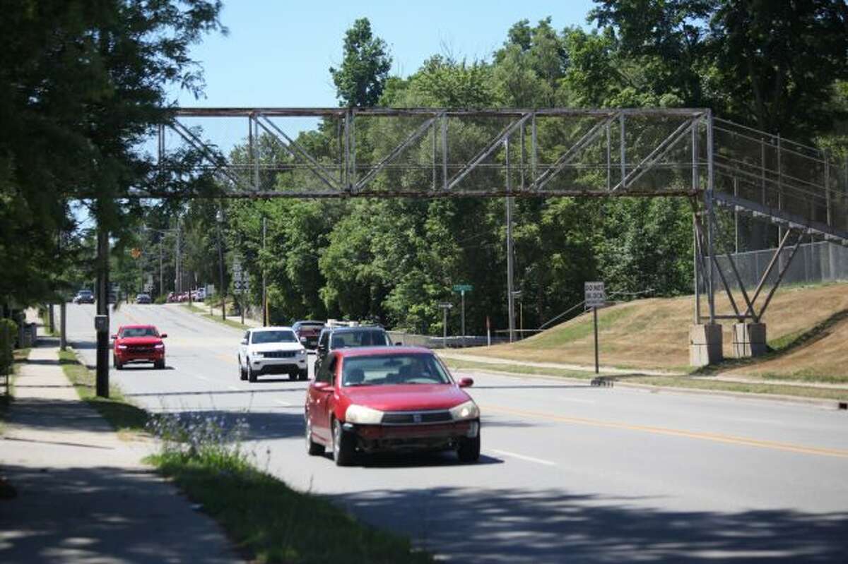 Although many people are concerned removing the pedestrian walk bridge spanning across North State Street will make it dangerous for students to cross the street from Crossroads Charter Academy, the school's superintendent, Christopher White, explained having a crosswalk and crossing guard in the area will be an effective method of keeping children safe because they are not allowed to leave school during the middle of the day.