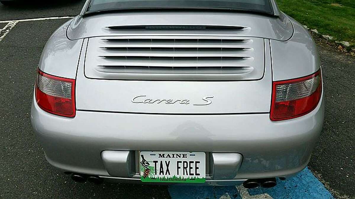 A vehicle formerly owned by John Chaponis with a fake Maine license plate on it. The car was never registered in Maine, but Chaponis uses it to highlight the issue of more Connecticut residents registering their cars in Maine.